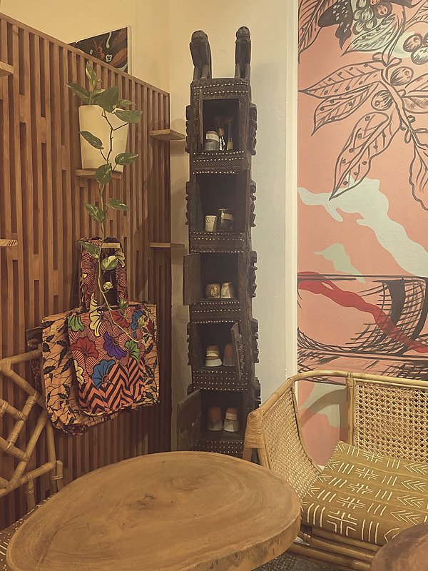 An African shelf lined with handmade cups
